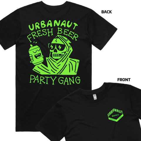 A picture of a black short-sleeved t-shirt with a neon green design on the back of a reaper drinking a beer and an inset picture of the front of the t-shirt with the Urbanaut logo as a small pocket-sized print on the left shoulder.